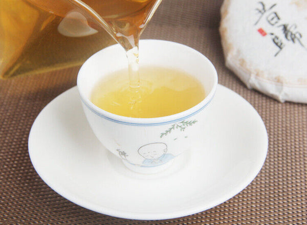 100g/cake Yunnan Pu'er raw tea cake Xigui wilderness tea Icelandic tea