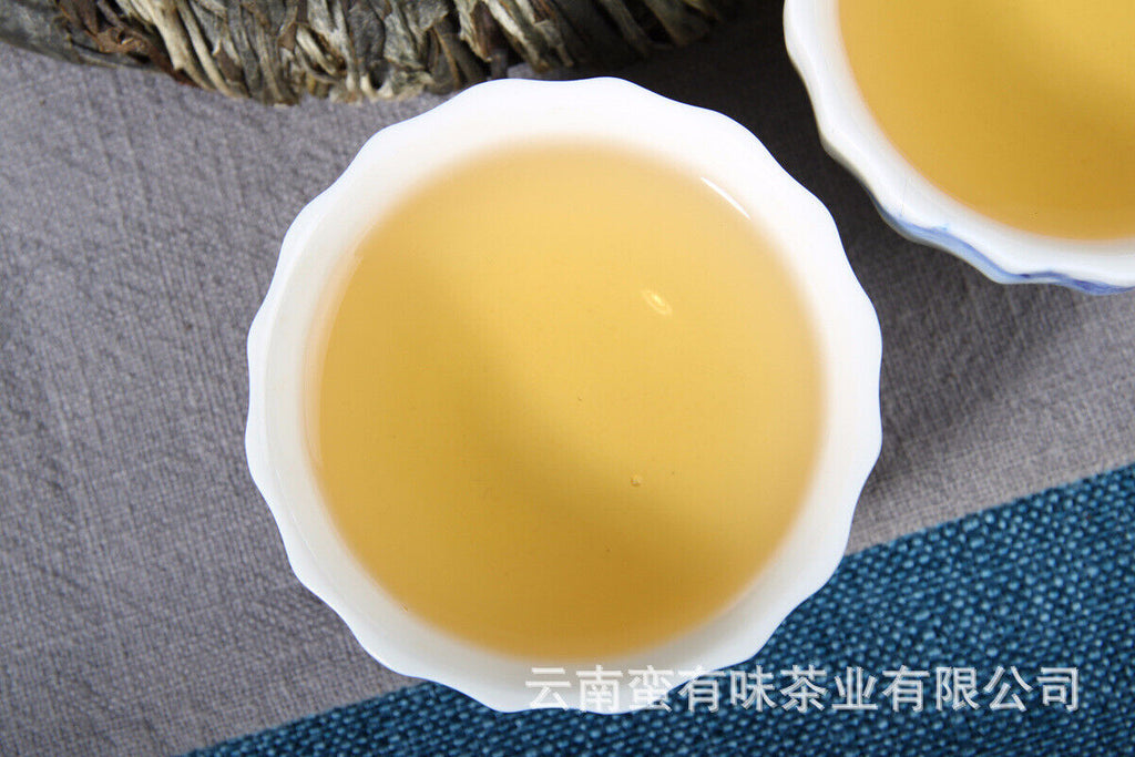 357g Yunnan Pu'er tea leaves Menghai Da Shu tea Putzi tea cake Pu'er raw tea