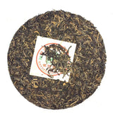 2006 Nanqiao Menghai Arbor Wild Tea Silver Needle Tribute Cake Raw Pu'er 250g