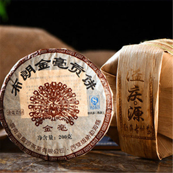 Yunnan Pu-erh Tee Pu'er Reifer Tee Jinmao Gong Kuchen Brown Tree Old Tea Kuchen
