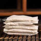 Chrysanthemum Cassia Seed Tea for Night Recovery in Brown Paper Bags