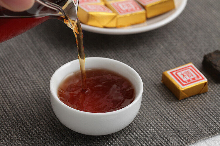 Menghai Pu'er ripe tea small square brick tea leaves sinensis word Pu'er tuocha