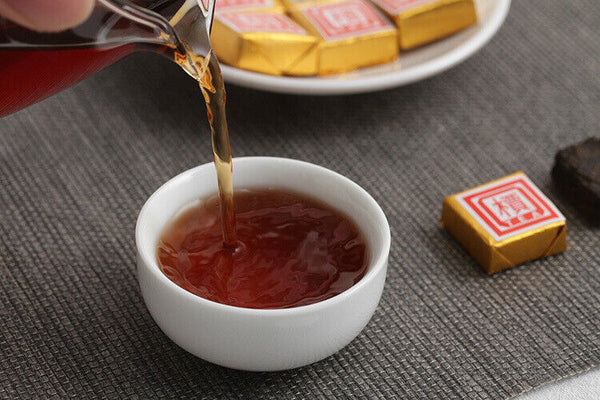 Menghai Pu'er ripe tea small square brick tea leaves sinensis word Pu'er tuocha