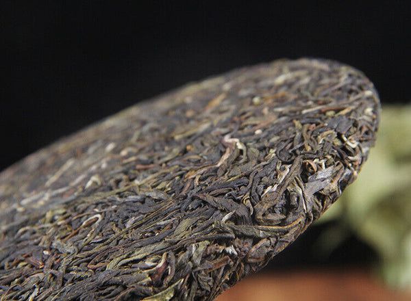 Icelandic raw tea cake spring tea pure sweet Mengku Pu'er seven seed cake tea