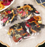 Dark plum hawthorn lotus leaf tea flowers and plants cold brewed tangerine tea