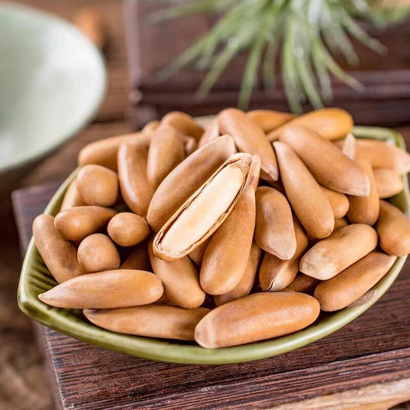 Hand-peeled pine nuts New Brazilian pine nuts Long grain large granular snack Secondary image