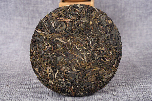 Yiwu Raw Tea 200g Raw Tea Cake Yunnan Ancient Tree Healthy Drink