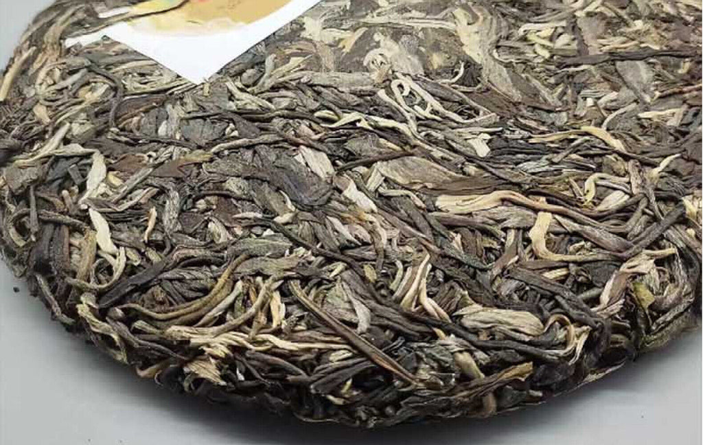Yunnan Tea Nannoushan Head Spring Ancient Tree Pu'er Raw Tea 357g Cake Tea