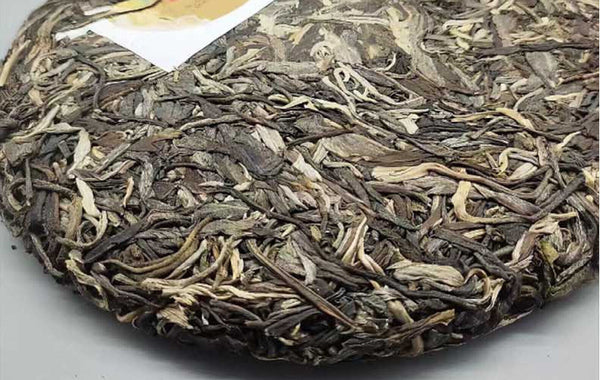 Yunnan Tea Nannoushan Head Spring Ancient Tree Pu'er Raw Tea 357g Cake Tea