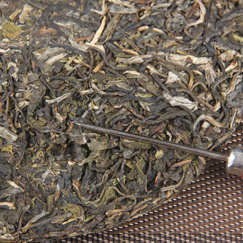 Iceland tree raw tea cake spring tea pure sweet new teaMengku pure tea Pu-erh