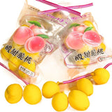 Süß-saure knusprige Pfirsiche, gelbe Pfirsiche, kandierter Obstsnack