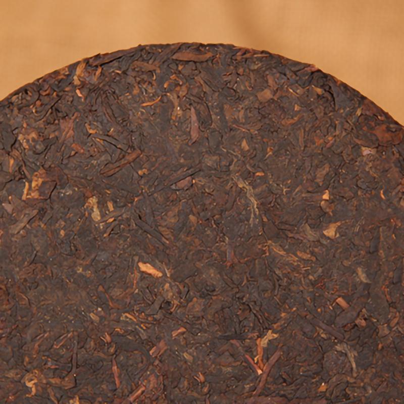 357g Certified Organic Yunnan Seven Tea Cake, Eight-Year-Old Pu'er Ripe Tea