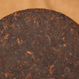 357g Certified Organic Yunnan Seven Tea Cake, Eight-Year-Old Pu'er Ripe Tea