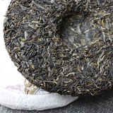 357g de thé Pu'er au début du printemps sept gâteaux islandais thé cru Pu'er
