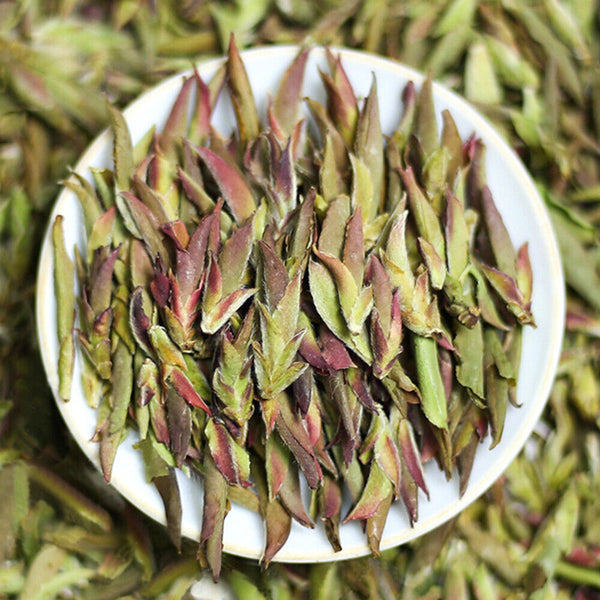 Thé Pu'er bourgeon violet début du printemps nouveau thé thé au nectar Mingqian