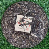 2013 Nannuoshan Raw Pu-erh Tea Cake Aged Puer Cake Tea Yunnan Puerh Raw Tea 357g