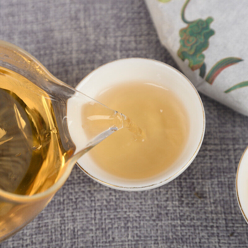 Yiwu Organic Green Tea Spring Tea Yunnan Cake Tea Beneficial Health Tea 357g Main image