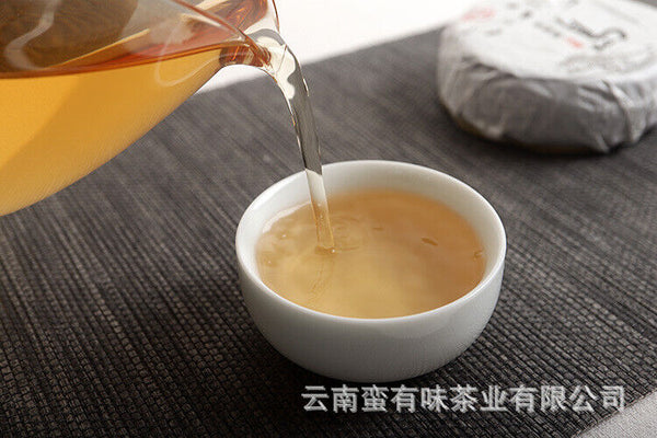100g Pu'er Tea Le Xing Xiang Icelandic Ming Qian Spring Tea(Mooncake Shape)