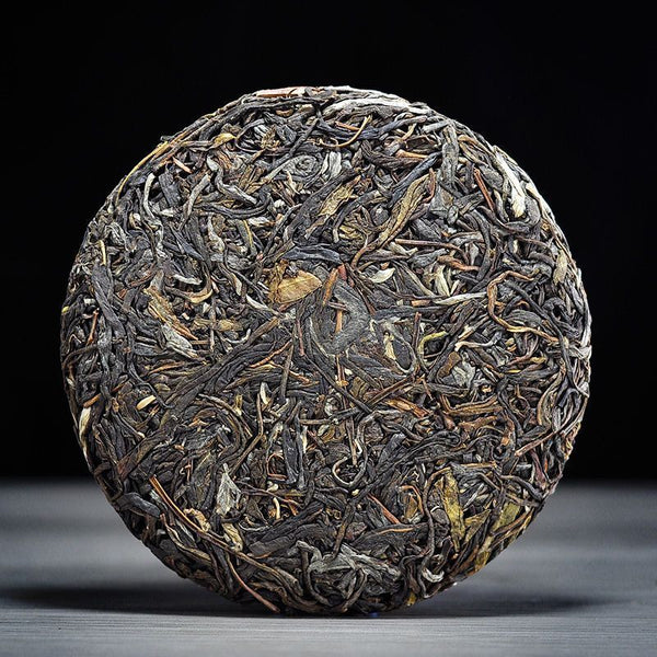 Pu-erh Raw Tea Yunnan Ancient Tree Pure Material Seven Seed Cake Spring Tea 200g