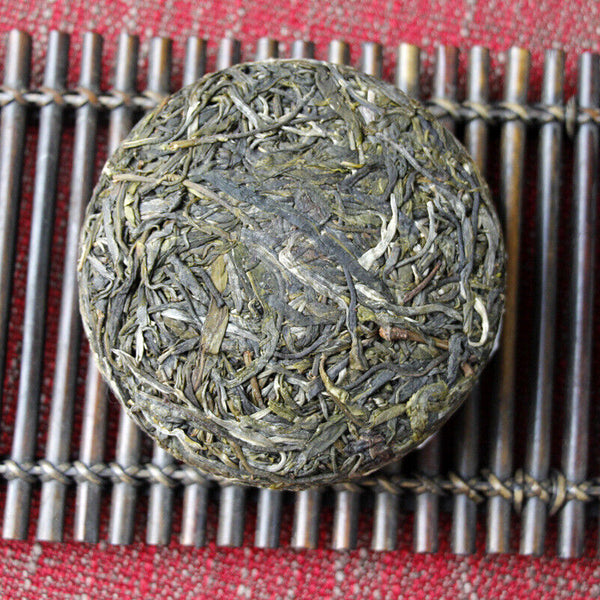 Thé Pu'er du Yunnan 100g Malachite d'islande thé vert à sept graines gâteau