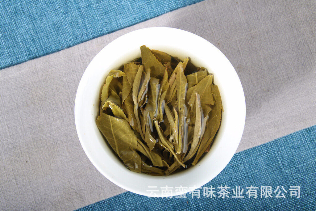 357g Yunnan Pu'er tea leaves Menghai Da Shu tea Putzi tea cake Pu'er raw tea