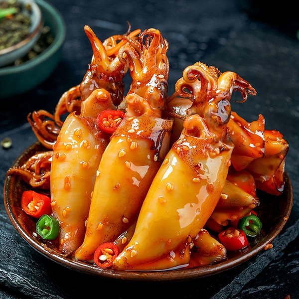 Spicy ready-to-eat seafood snack: baby octopus and octopus in glass