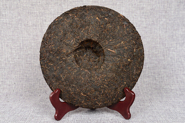 357 g Yunnan deep mountain wild flavor cooked cake seven sub cake Pu'er tea