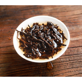 Bajiaoting Valley Flower TeaChaPu'er KONG QUE ZHI XIANG QI ZI BING 357g