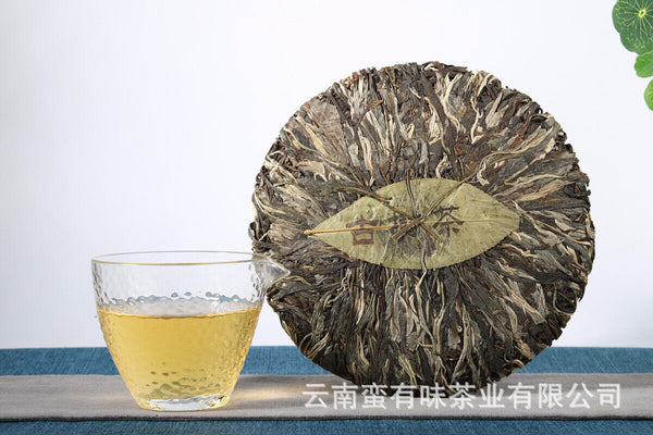 357g Yunnan Pu'er tea leaves Menghai Da Shu tea Putzi tea cake Pu'er raw tea
