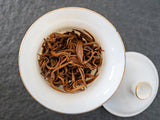 Fengqing Dian Hong tea gold snail spring tea Yunnan black tea red snail gold bud