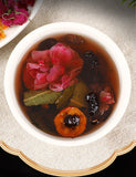 Dark plum hawthorn lotus leaf tea flowers and plants cold brewed tangerine tea