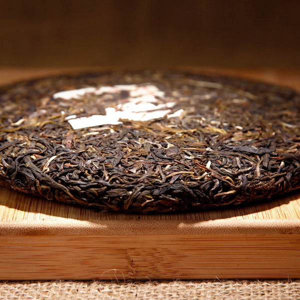 Yunnan Qizi Tea Cake Pu'er Raw Tea Cake Jishun Hao Strength Pai Pu'er Tea 330g