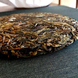 357g Pu'er raw tea golden leaves golden Mengku yellow slices, seven seed cakes