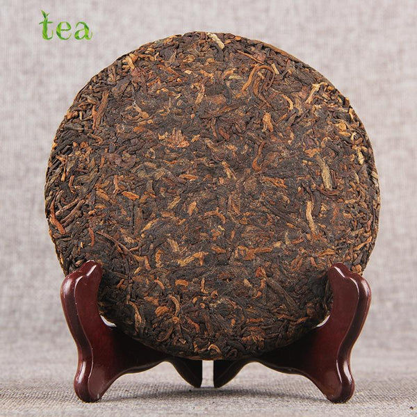 CIFbuy Yunnan Pu'er Menghai Chenxiang Chunyun 200g Ripe Tea Qizi Cake
云南普洱勐海陈香春韵200克熟茶七子饼