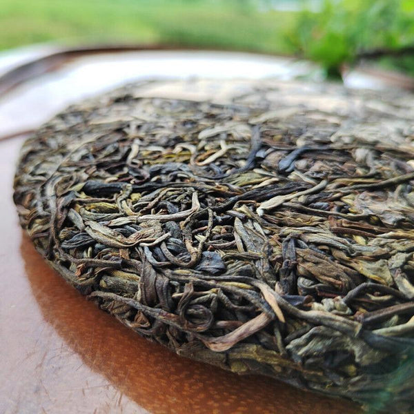 CIFbuy 357g Pu'er tea raw tea cake Yiwu Zhengshan Pu'er Yunnan seven cakes tea leaves