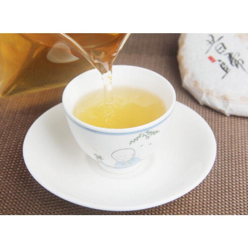 CIFbuy 100g/cake Yunnan Pu'er Raw Tea Cake Xigui Wilderness Tea Icelandic Tea