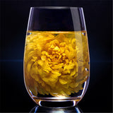A large Cup of Organic Herbal Tea in Summer Gold Huang Ju 4 pieces chrysanthemum