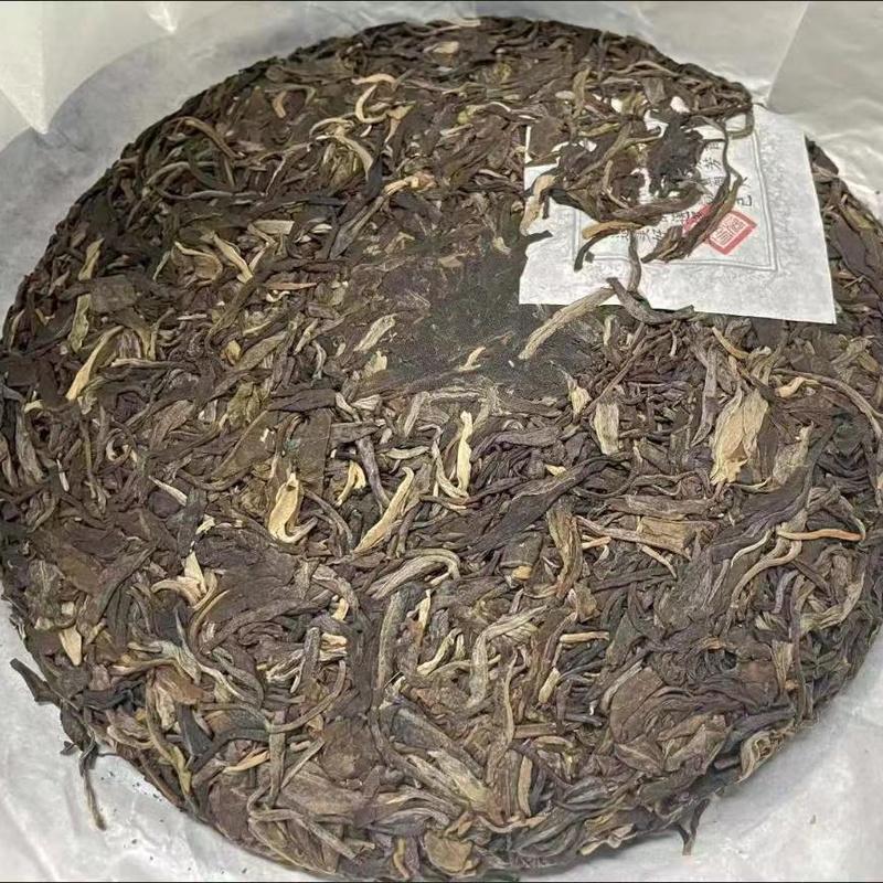 CIFbuy 357g Raw Puerh Tea Cake Xinyihao Bulang Mountain Pu-erh Tea Benefits Green Tea Main image