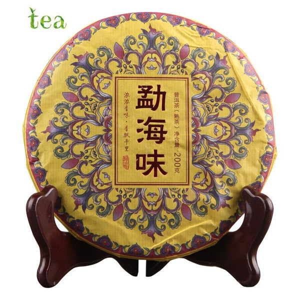 CIFbuy Yunnan Pu'er Menghai Chenxiang Chunyun 200g Ripe Tea Qizi Cake
云南普洱勐海陈香春韵200克熟茶七子饼