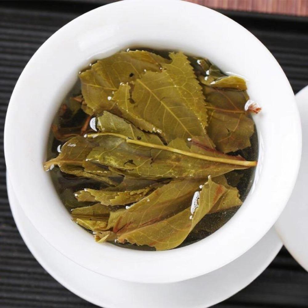 CIFbuy 250g Lincang Xigui Ancient Tree Yellow Leaf Raw Yunnan Pu'er Tea Brick