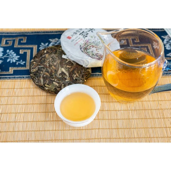 CIFbuy 100g Pu'er Raw Tea Iceland Yunnan Ancient Tea Spring Tea Cake Orchid Fragrance