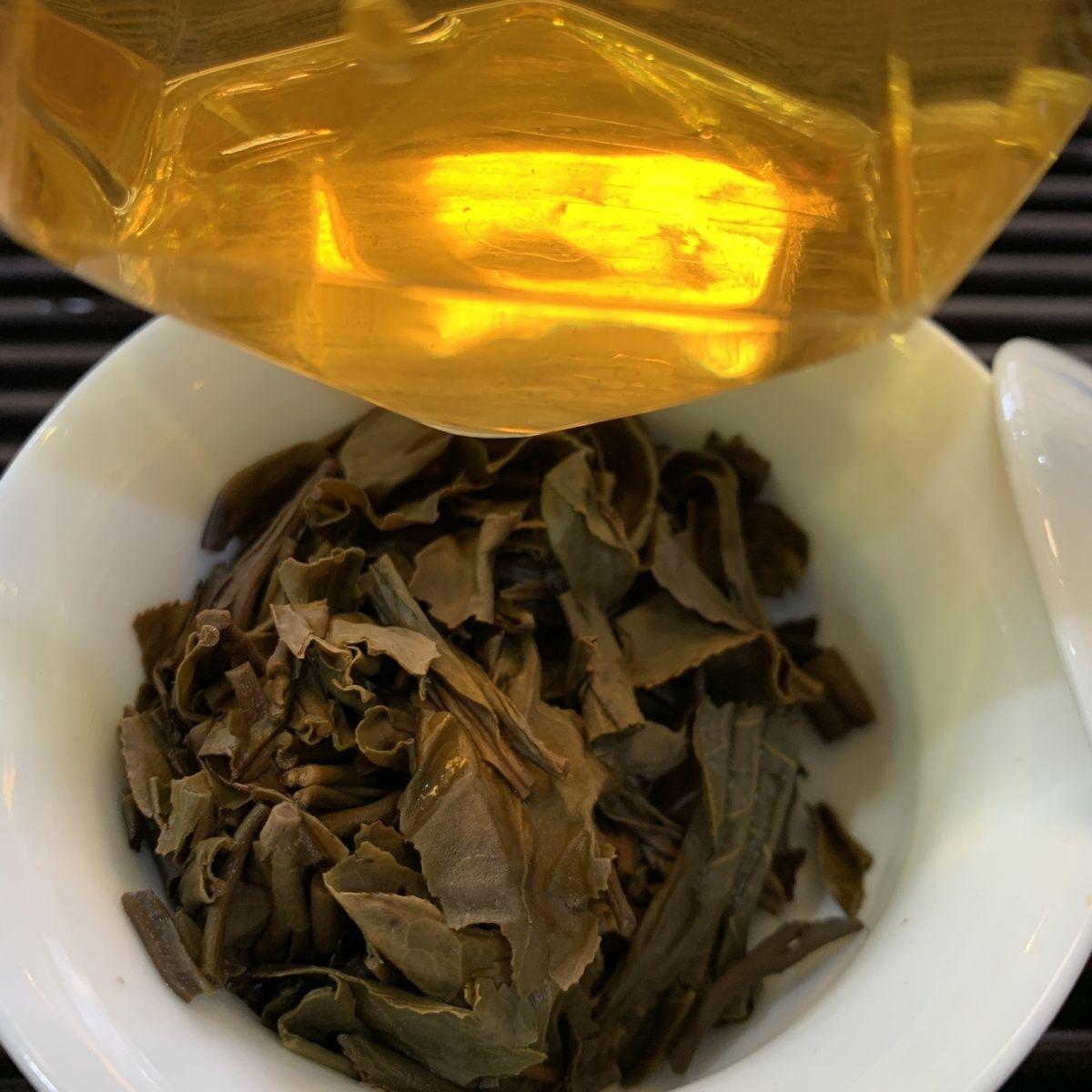 CIFbuy 2014 NAN QIAO Gao Dang Qing Bing Shen Yunnan Pu-erh Menghai Puer Tea Raw 357g
