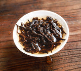 Bajiaoting Valley Flower Tea Raw Pu'er KONG QUE ZHI XIANG QI ZI BING 357g