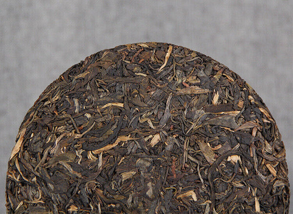 Yr Nan Nuo Shan Qiao Mu Qi Zi Yuan Cha Collection Menghai Raw Puer Tea 357g
