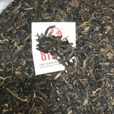 Early Spring 8113 Tie Bing * 2015 XiaGuan Tuocha Puer Puerh Raw Pu'er Sheng 357g