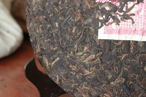 Yunnan Tong Qing Hao Yiwu Mt. Old Tea Ripe Puer Cooked Puerh Tea Cake 357g