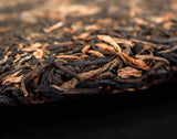 Bajiaoting Valley Flower Tea Raw Pu'er KONG QUE ZHI XIANG QI ZI BING 357g