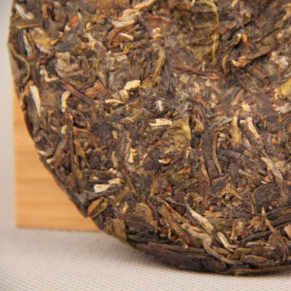 Thé Pu'er cru 100g petit gâteau thé Pu'er du vieil arbre des montagnes profondes