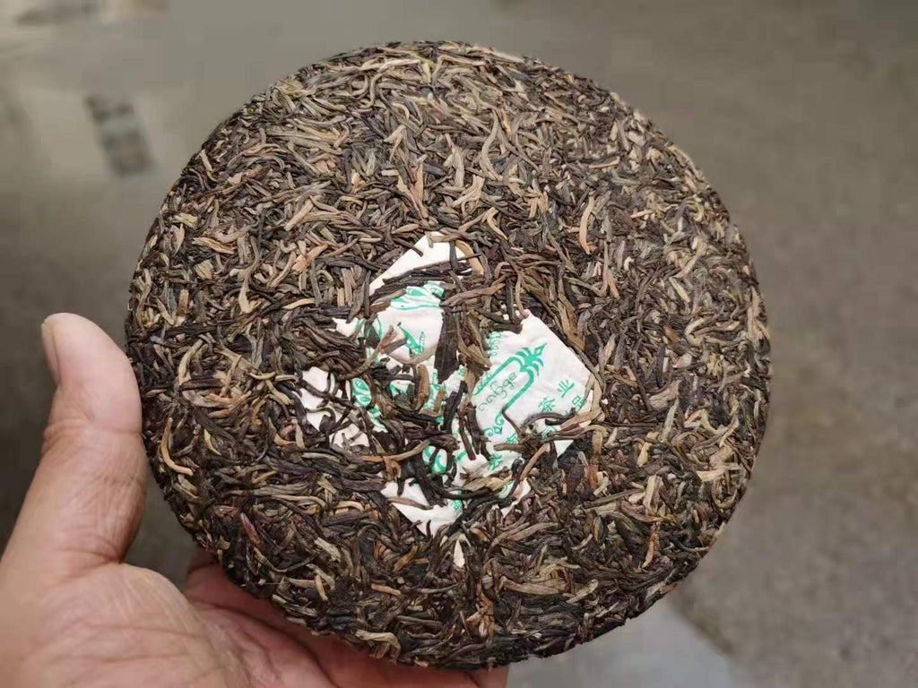Nanqiao Menghai Arbor Wild Tea Silver Needle Tribute Cake Raw Pu'er 250g