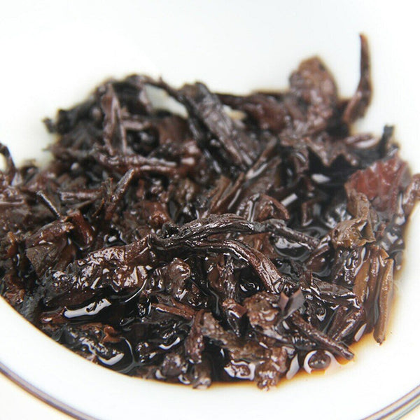 Shu Pu-erh Tea Palace and The Charm of Time Qi Zi Bing Ripe Puer Tea 357g